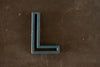 Vintage Industrial Letter "L" Black with Blue and Orange Paint, 2" tall (c.1940s) - thirdshift