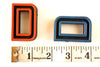 Vintage Industrial Letter "D" Black with Red and Blue Paint, 2" tall (c.1940s) - thirdshift