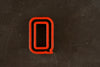 Vintage Industrial Letter "Q" Black with Orange and Green Paint, 2" tall (c.1940s) - thirdshift