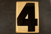 Vintage Industrial Metal Number 4 Sign, Gas Station Sign in Ivory and Black, 13.5" tall (c.1950s) - thirdshift