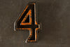 Vintage Industrial Number "4" Black with Chippy Orange and Blue Paint, 2" tall (c.1940s) - thirdshift