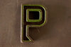 Vintage Industrial Letter "P" Black with Green and Orange Paint, 2" tall (c.1940s) - thirdshift