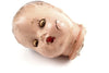 Vintage Composition Baby Doll Head with Sleep Eyes and Molded Hair, 5" tall (c.1920s) - thirdshift