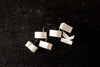 Vintage White Ceramic Push Pins "SPOOKY" (c.1940s) - thirdshift
