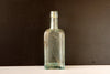 Vintage E.C. DeWitt Aqua Glass Apothecary Bottle, Doctors Elixir (c.1920s) - thirdshift