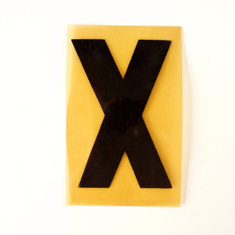 Vintage Industrial Marquee Sign Letter "X", Black on Yellow Flexible Plastic, 7" tall (c.1970s) - thirdshift