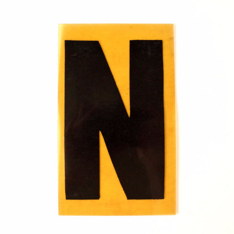 Vintage Industrial Marquee Sign Letter "N", Black on Yellow Flexible Plastic, 7" tall (c.1970s) - thirdshift