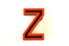 Vintage Industrial Letter "Z" Black with Orange and Blue Paint, 2" tall (c.1940s) - thirdshift