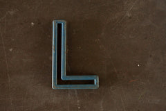 Vintage Industrial Letter "L" Black with Blue and Orange Paint, 2" tall (c.1940s) - thirdshift