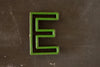 Vintage Industrial Letter "E" Black with Green and Red Paint, 2" tall (c.1940s) - thirdshift