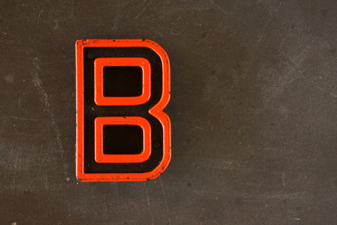 Vintage Industrial Letter "B" Black with Orange and Blue Paint, 2" tall (c.1940s) - thirdshift