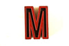 Vintage Industrial Letter "M" Black with Green and Red Paint, 2" tall (c.1940s) - thirdshift