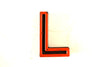 Vintage Industrial Letter "L" Black with Blue and Orange Paint, 2" tall (c.1940s) - thirdshift