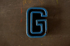 Vintage Industrial Letter "G" Black with Blue and Orange Paint, 2" tall (c.1940s) - thirdshift