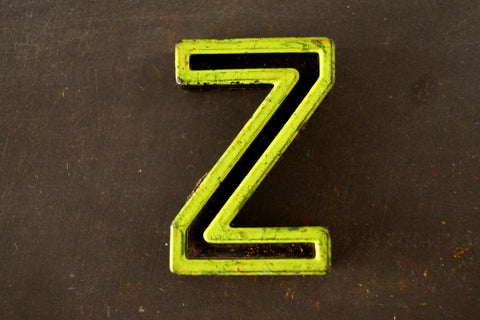 Vintage Industrial Letter "Z" Black with Light Green and Light Orange Paint, 2" tall (c.1940s) - thirdshift