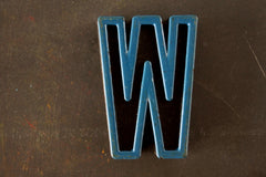 Vintage Industrial Letter "W" Black with Blue and Orange Paint, 2" tall (c.1940s) - thirdshift