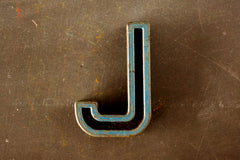 Vintage Industrial Letter "J" Black with Blue and Orange Paint, 2" tall (c.1940s) - thirdshift