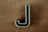 Vintage Industrial Letter "J" Black with Blue and Orange Paint, 2" tall (c.1940s) - thirdshift