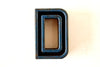 Vintage Industrial Letter "D" Black with Light Orange and Blue Paint, 2" tall (c.1940s) - thirdshift