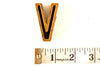 Vintage Industrial Letter "V" Black with Light Orange and Blue Paint, 2" tall (c.1940s) - thirdshift