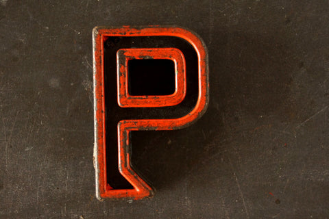 Vintage Industrial Letter "P" Black with Orange and Blue Paint, 2" tall (c.1940s) - thirdshift