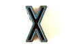 Vintage Industrial Letter "X" Black with Red and Blue Paint, 2" tall (c.1940s) - thirdshift