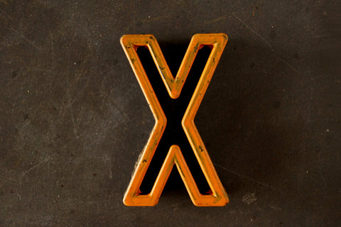 Vintage Industrial Letter "X" Black with Light Orange and Blue Paint, 2" tall (c.1940s) - thirdshift