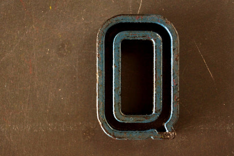 Vintage Industrial Letter "Q" Black with Blue and Green Paint, 2" tall (c.1940s) - thirdshift