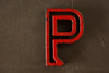 Vintage Industrial Letter "P" Black with Red and Green Paint, 2" tall (c.1940s) - thirdshift