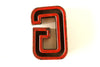 Vintage Industrial Letter "G" Black with Green and Red Paint, 2" tall (c.1940s) - thirdshift