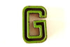 Vintage Industrial Letter "G" Black with Green and Red Paint, 2" tall (c.1940s) - thirdshift