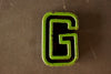 Vintage Industrial Letter "G" Black with Green and Red Paint, 2" tall (c.1940s) - thirdshift