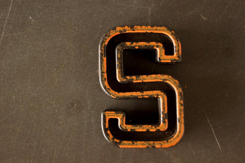 Vintage Industrial Letter "S" Black with Orange and Blue Paint, 2" tall (c.1940s) - thirdshift