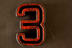 Vintage Industrial Number "3" Black with Orange and Green Paint, 2" tall (c.1940s) - thirdshift