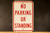 Vintage Metal "No Parking or Standing" Sign in Red and White, 18" tall (c.1970s) - thirdshift